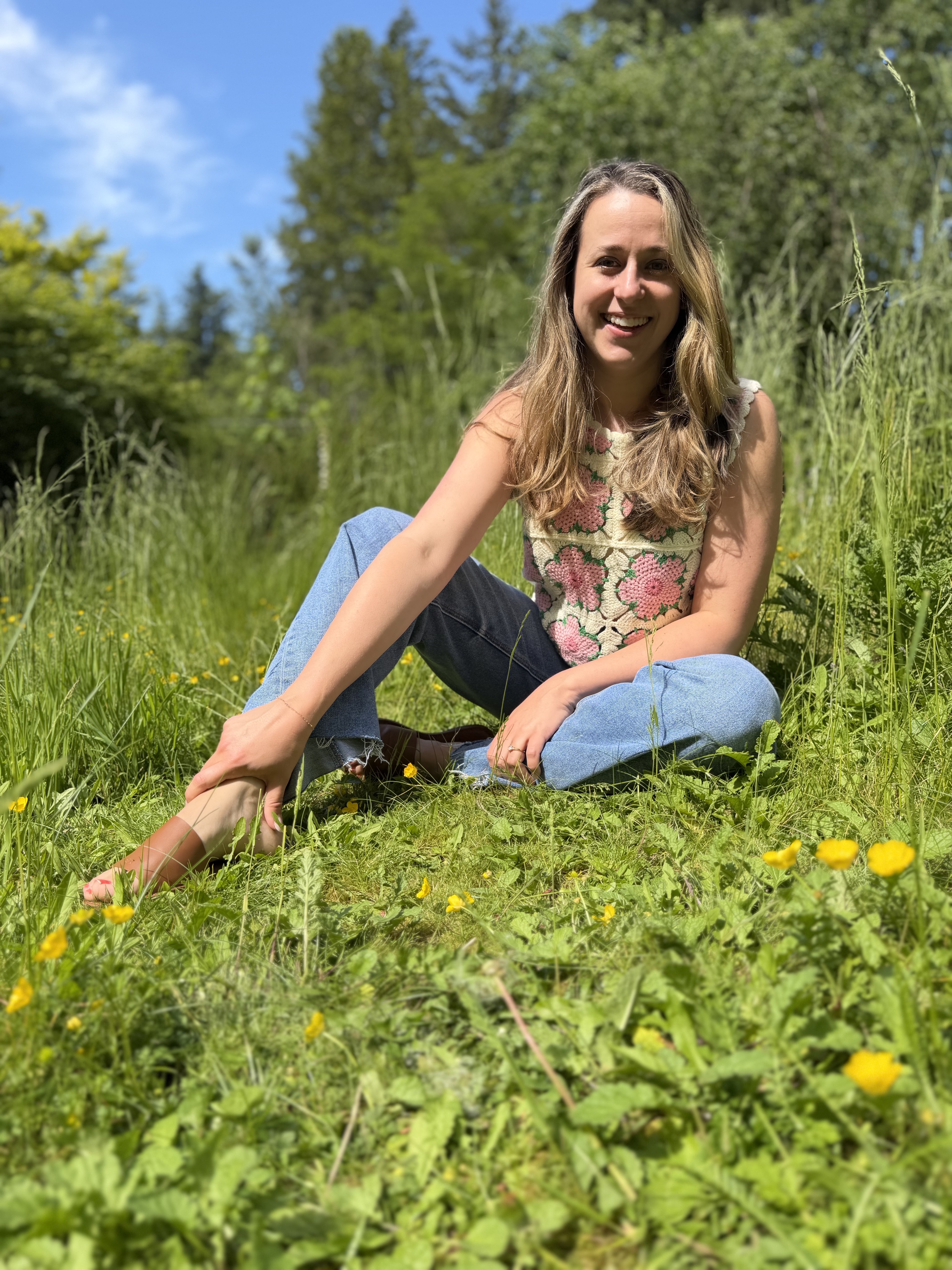 Elizabeth Duffy sitting outdoors